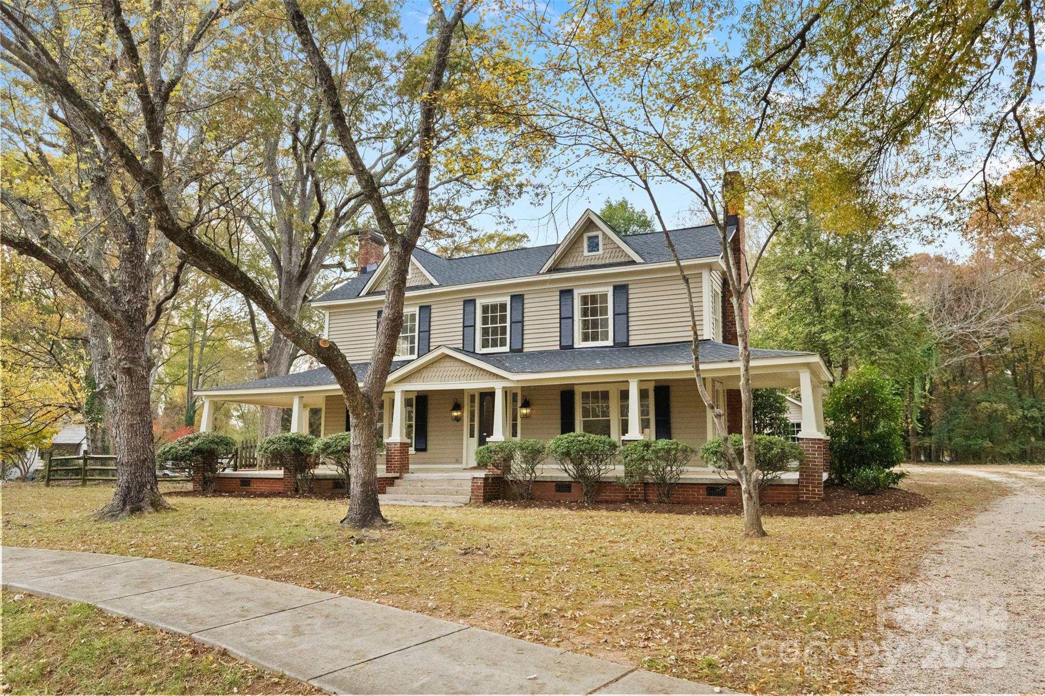 5607 Matthews-Mint Hill Road Charlotte, NC 28227 - Photo 40 of 45 a front view of a house with a yard