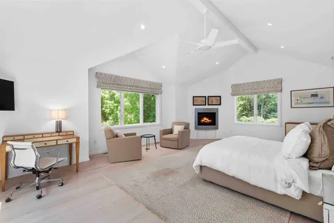 a bedroom with a bed and furniture