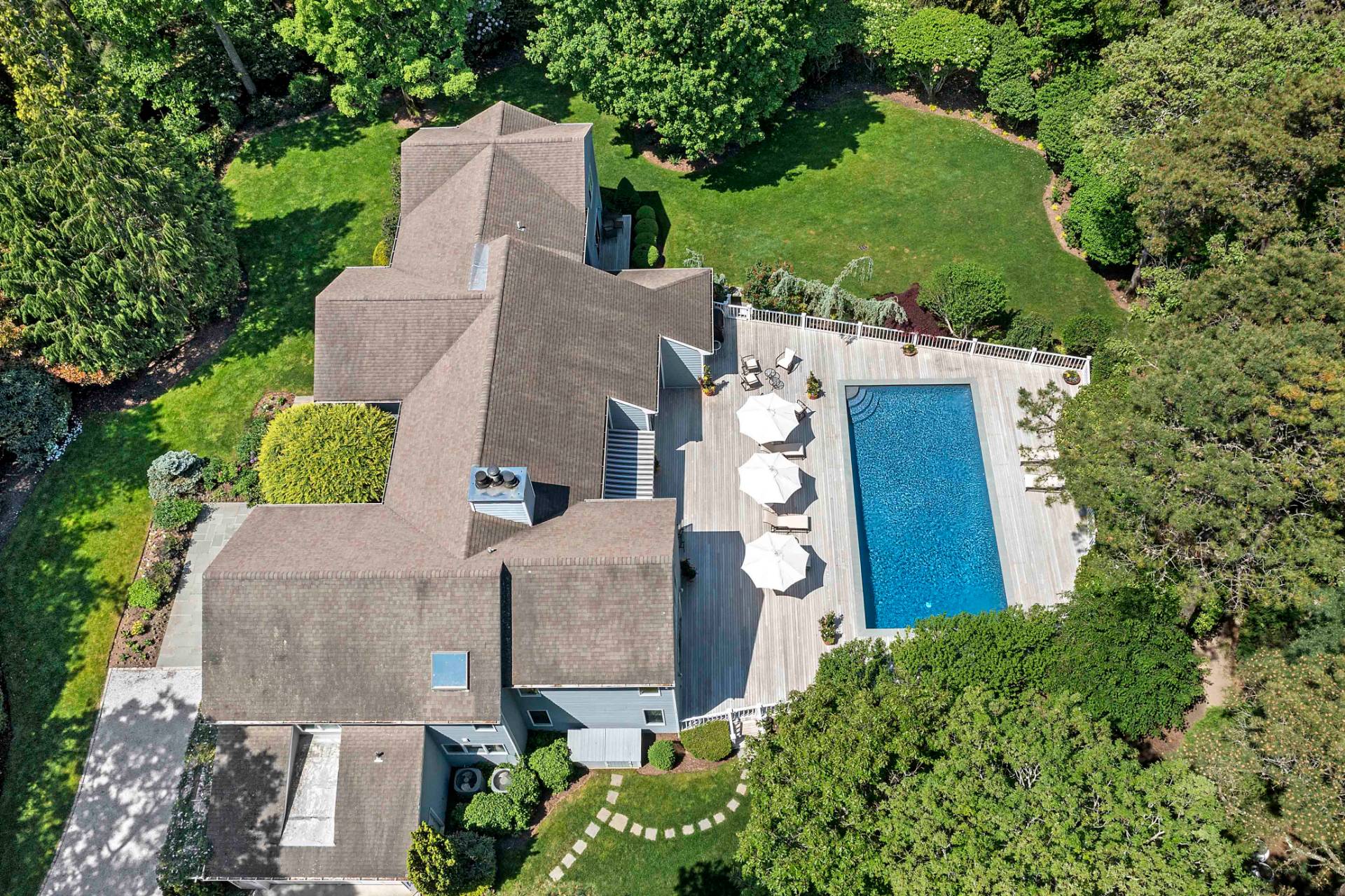 3 Acorn Path Quogue, NY 11959 - Photo 20 of 23 an aerial view of a house with outdoor space and trees all around