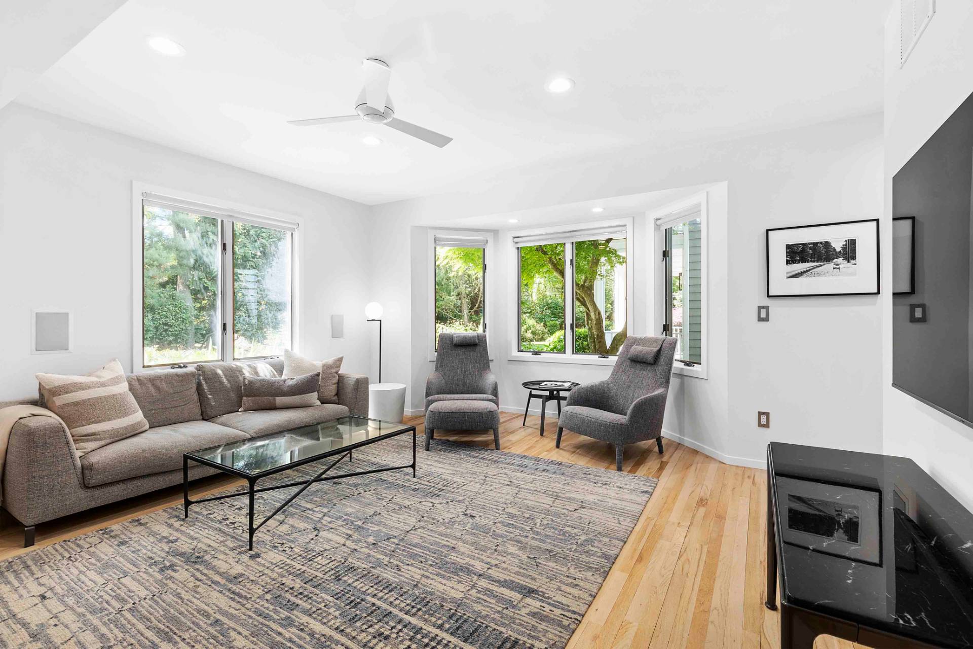3 Acorn Path Quogue, NY 11959 - Photo 9 of 23 a living room with furniture and a large window