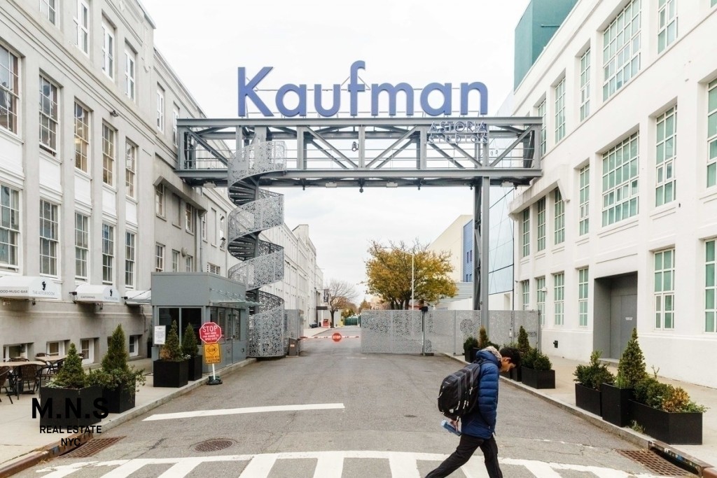 37-14 36th Street, Unit 10F Queens, NY 11101 - Photo 14 of 15 a street sign on a street corner