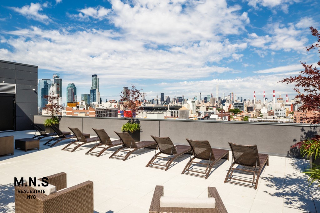 37-14 36th Street, Unit 10F Queens, NY 11101 - Photo 8 of 15 a view of a terrace with chairs and potted plants