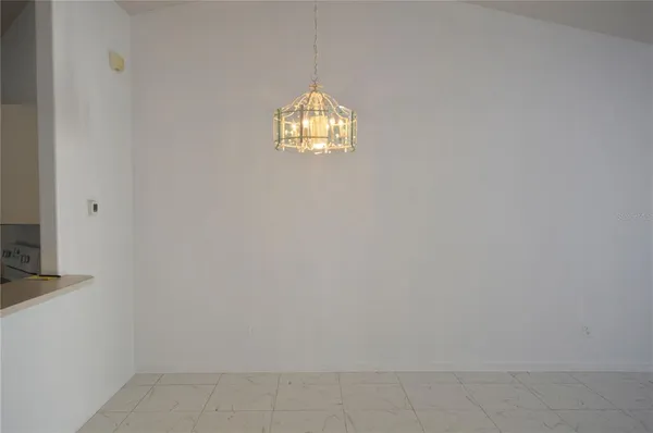 close up of hanging light and window