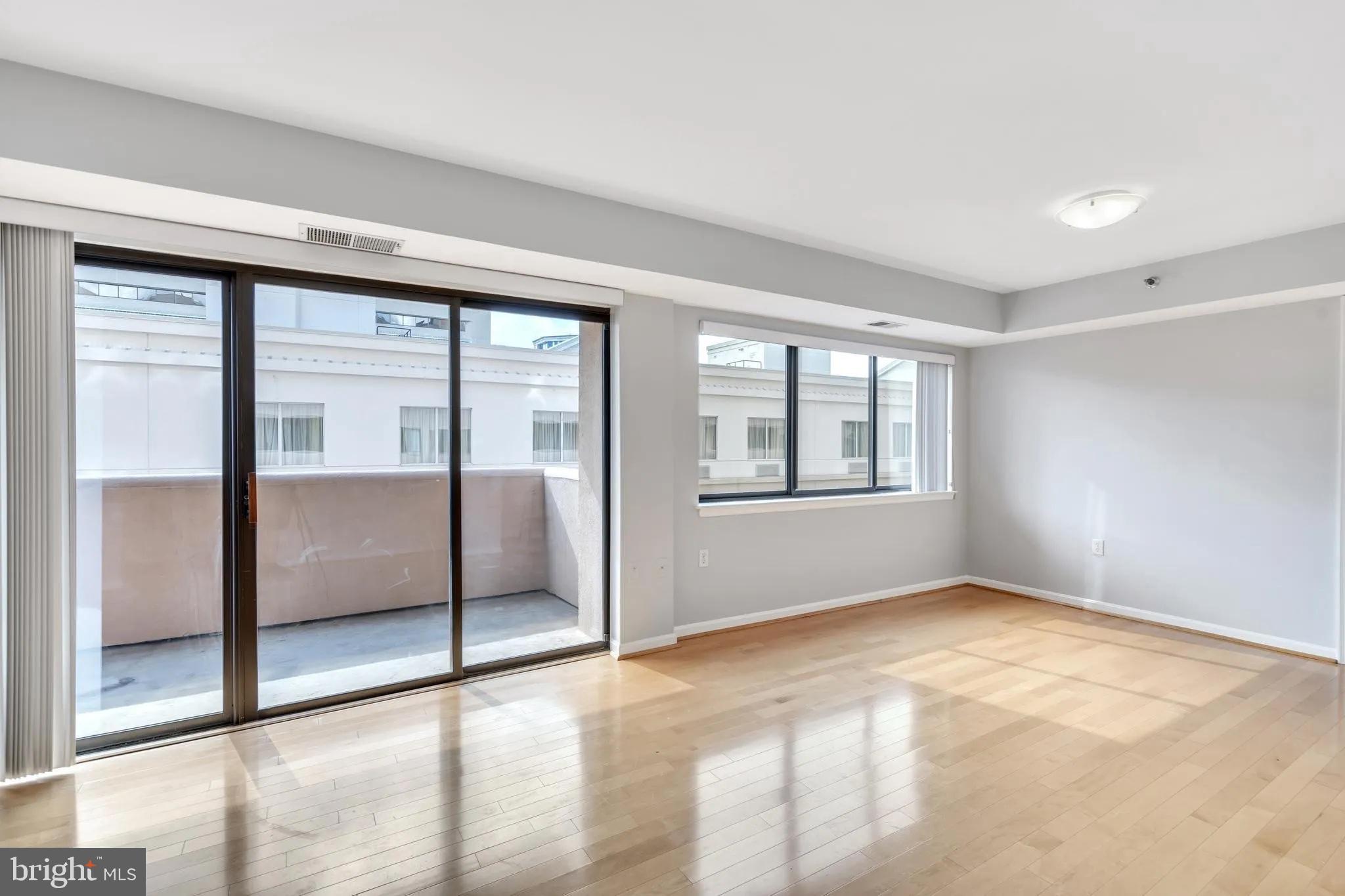 1301 North Courthouse Road, Unit 1007 Arlington, VA 22201 - Photo 11 of 41 a view of an empty room with window