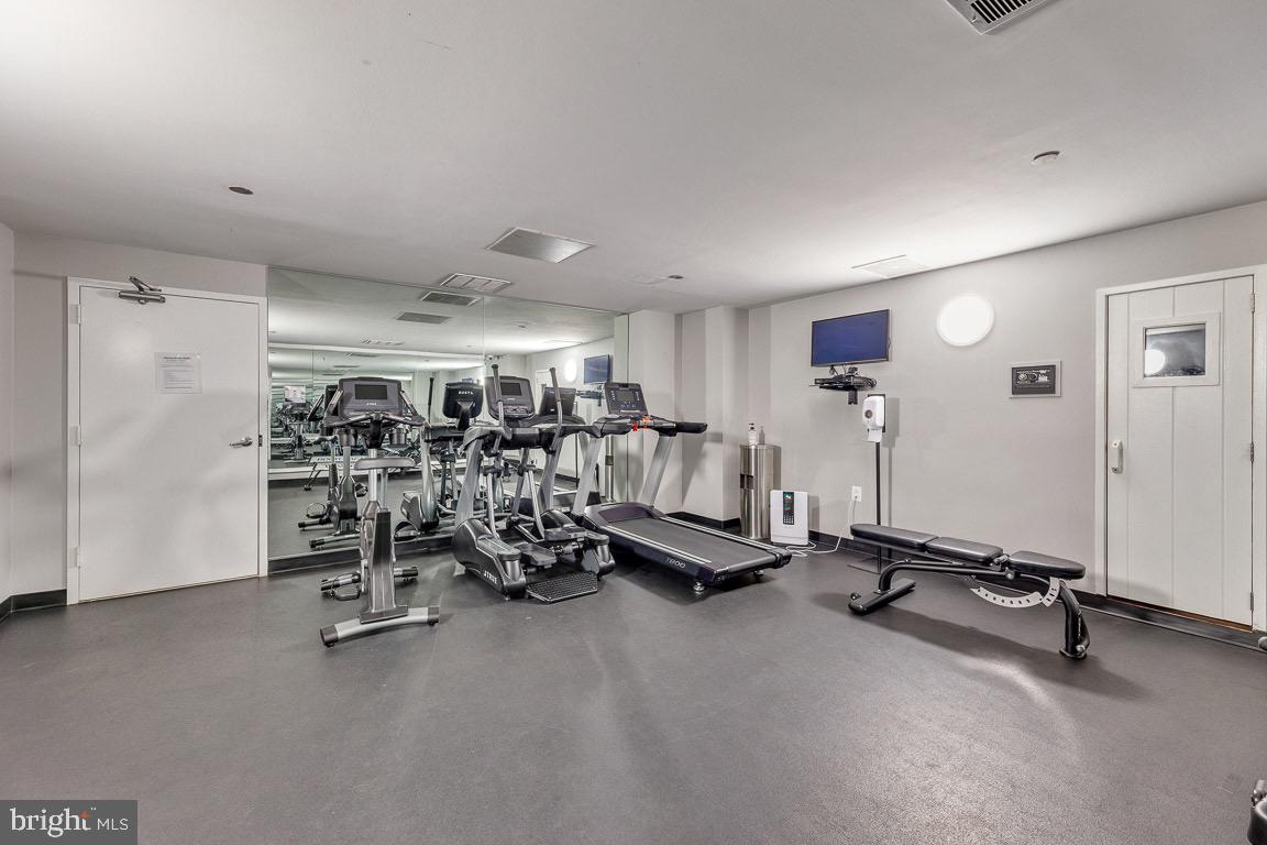1301 North Courthouse Road, Unit 1007 Arlington, VA 22201 - Photo 38 of 41 a view of a room with gym equipment