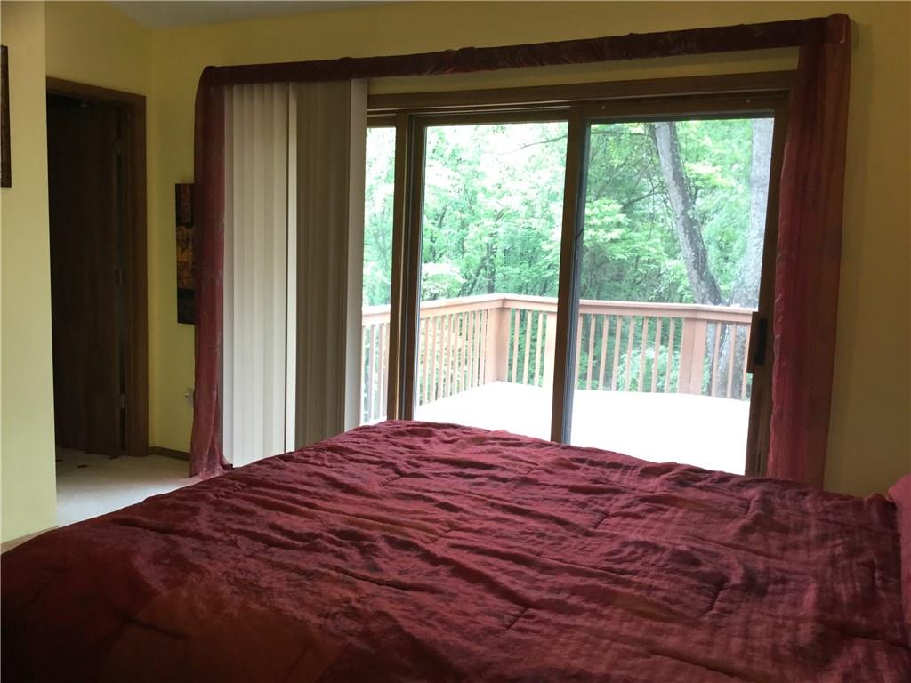 3636 Sandy Hill Road Gibsonia, PA 15044 - Photo 13 of 25 Master Bedroom: Sliding doors lead to the deck from your bedroom. This bedroom has a ceiling fan and shelf above the double closet for added decoration.