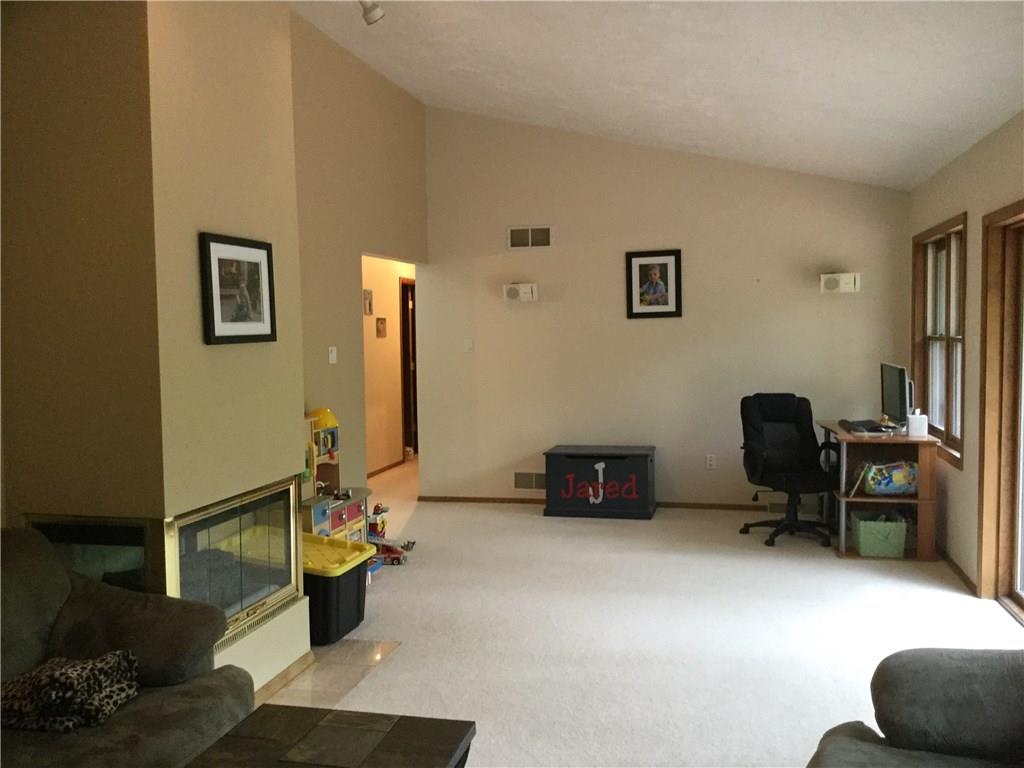 3636 Sandy Hill Road Gibsonia, PA 15044 - Photo 7 of 25 Living Room: Gas fireplace compliments this spacious room.