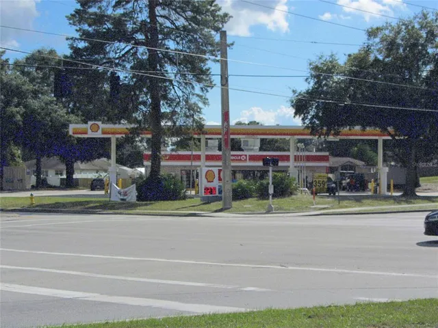 a view of street with tall buildings