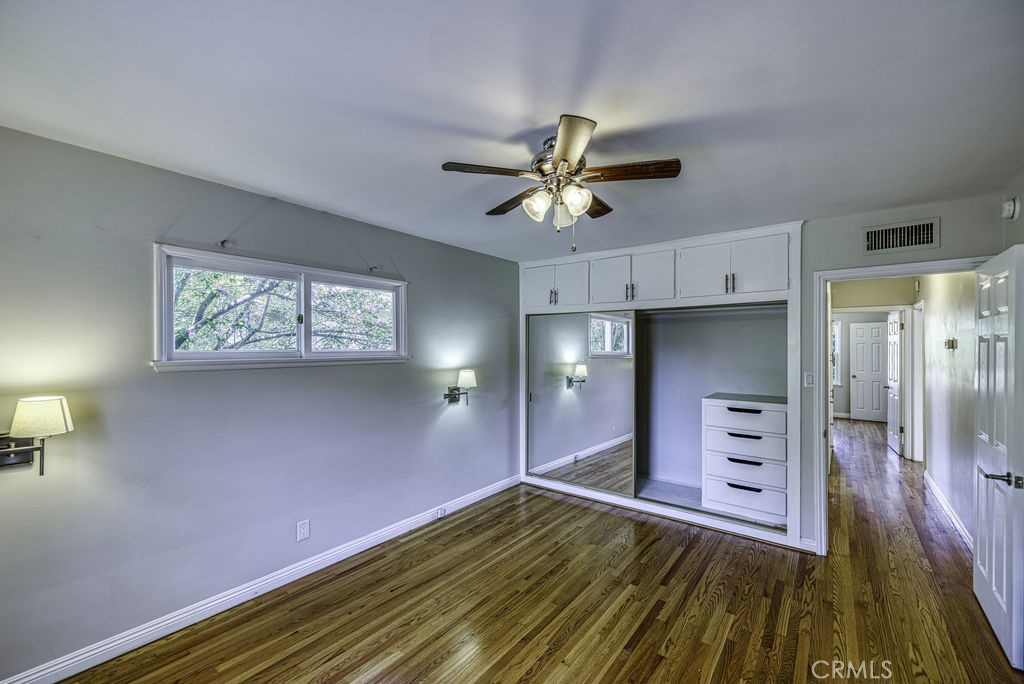 15744 Hart Street Van Nuys, CA 91406 - Photo 17 of 21 a view of empty room with wooden floor