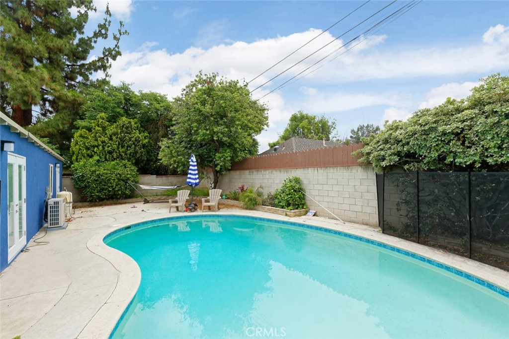 15744 Hart Street Van Nuys, CA 91406 - Photo 20 of 21 a view of a backyard with a small cabin