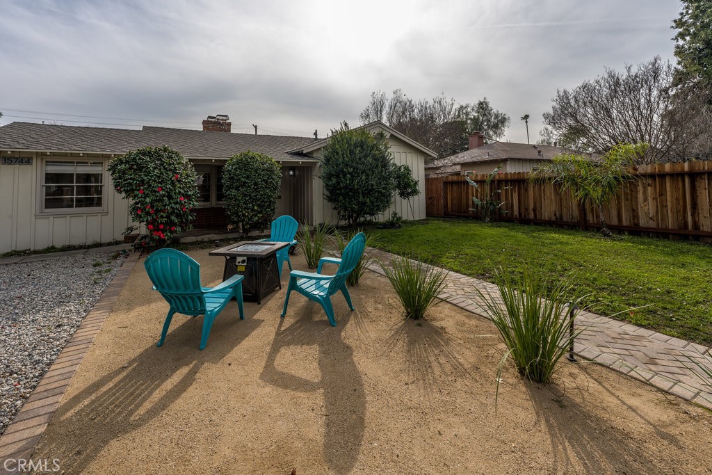 15744 Hart Street Van Nuys, CA 91406 - Photo 2 of 21 a view of a house with backyard sitting area and garden