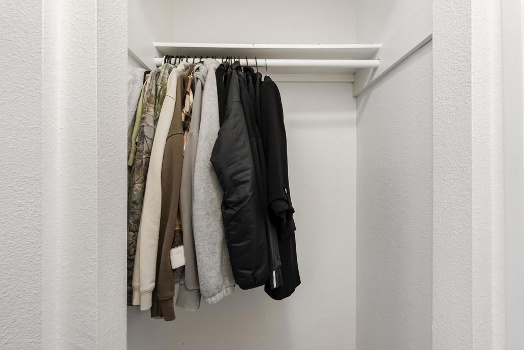 6780 Friars Road, Unit 243 San Diego, CA 92108 - Photo 19 of 31 a view of walk in closet with clothes and shoes