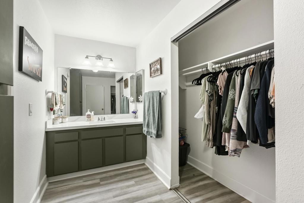 6780 Friars Road, Unit 243 San Diego, CA 92108 - Photo 24 of 31 a bathroom with a double vanity sink and mirror