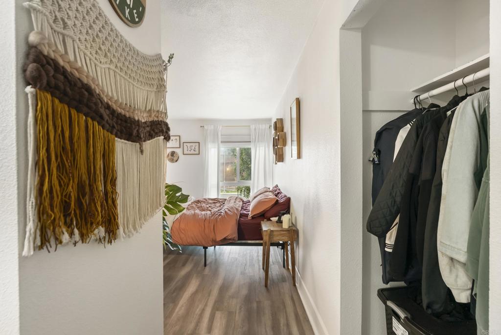 6780 Friars Road, Unit 243 San Diego, CA 92108 - Photo 25 of 31 a living room with furniture and a window