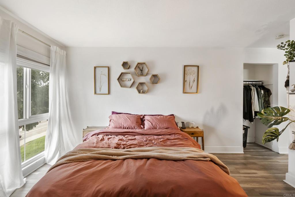 6780 Friars Road, Unit 243 San Diego, CA 92108 - Photo 28 of 31 a bedroom with a bed and a window