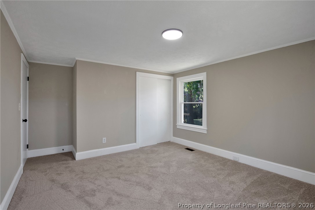88 Hannah Creek Road Four Oaks, NC 27524 - Photo 23 of 31 a view of an empty room with window