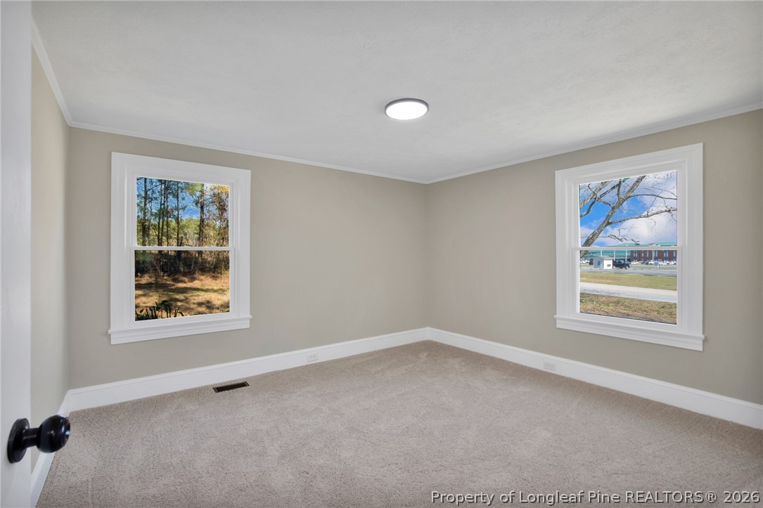 88 Hannah Creek Road Four Oaks, NC 27524 - Photo 24 of 31 wooden floor in a room next to a window