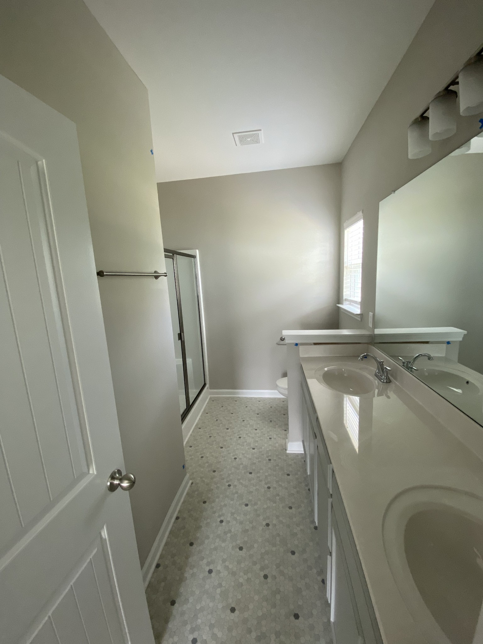 4118 Bungee Way Murfreesboro, TN 37128 - Photo 7 of 9 a view of a hallway with a washer and dryer