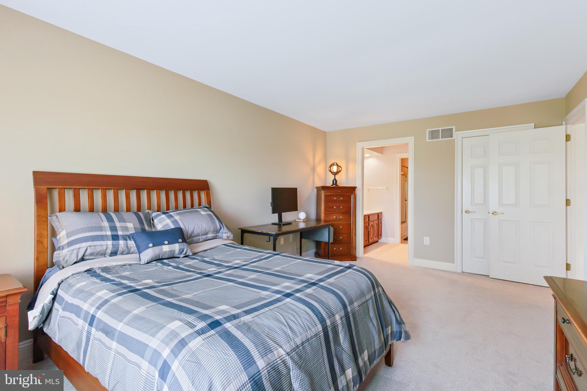 616 Northfield Road Lititz, PA 17543 - Photo 18 of 30 a bedroom with a bed and closet