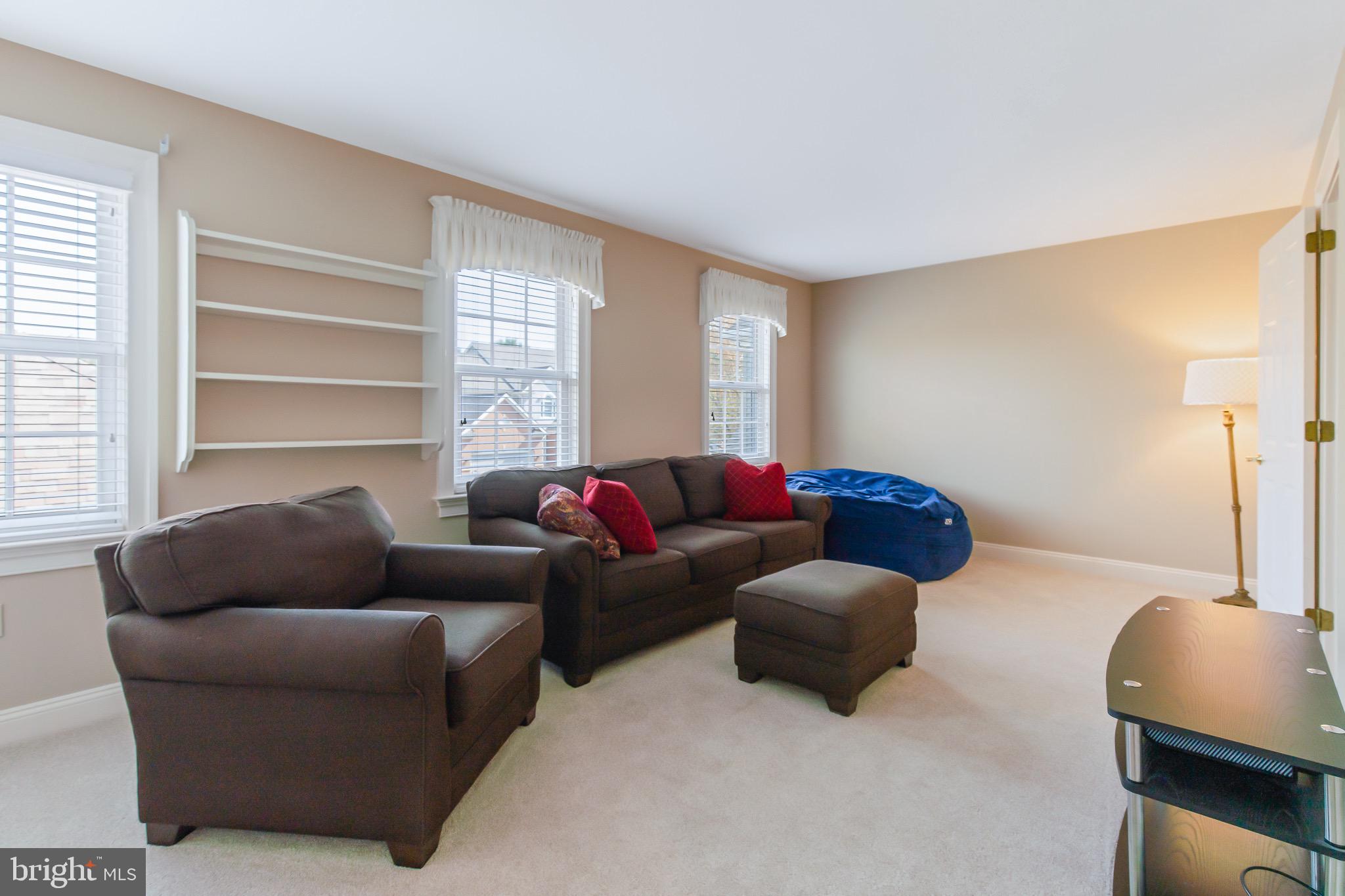 616 Northfield Road Lititz, PA 17543 - Photo 21 of 30 a living room with furniture and a window