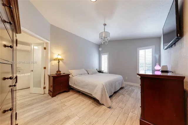 a bathroom with a shower a toilet and a shower