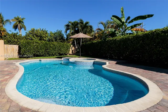 a view of a backyard with a garden