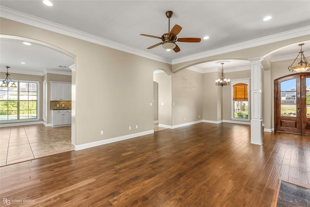4743 Old Brownlee Road Bossier City, LA 71111 - Photo 16 of 40 a view of an empty room and window with wooden floor