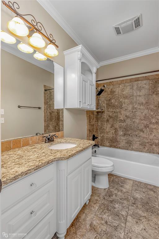 4743 Old Brownlee Road Bossier City, LA 71111 - Photo 38 of 40 a bathroom with a granite countertop sink toilet and shower