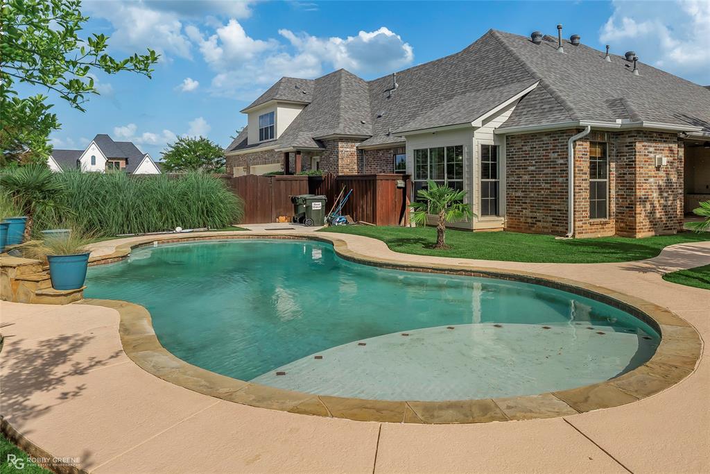 4743 Old Brownlee Road Bossier City, LA 71111 - Photo 8 of 40 a view of a house with a swimming pool