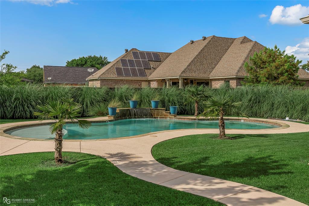 4743 Old Brownlee Road Bossier City, LA 71111 - Photo 9 of 40 a view of a house with a yard