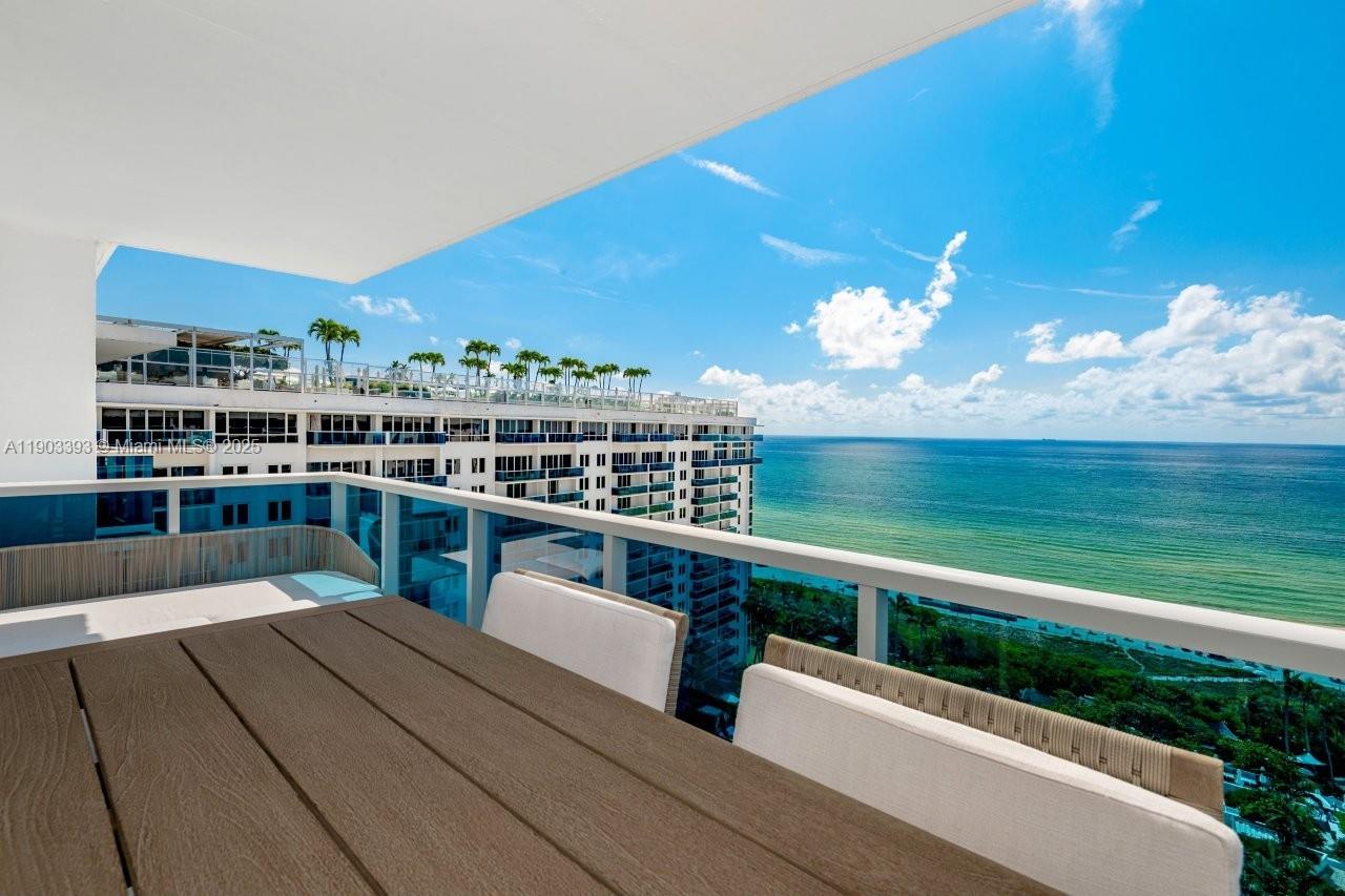 2301 Collins Avenue, Unit PH20 Miami Beach, FL 33139 - Photo 26 of 28 a view of a terrace with sitting area