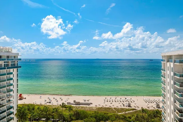 a view of a lake with a big yard