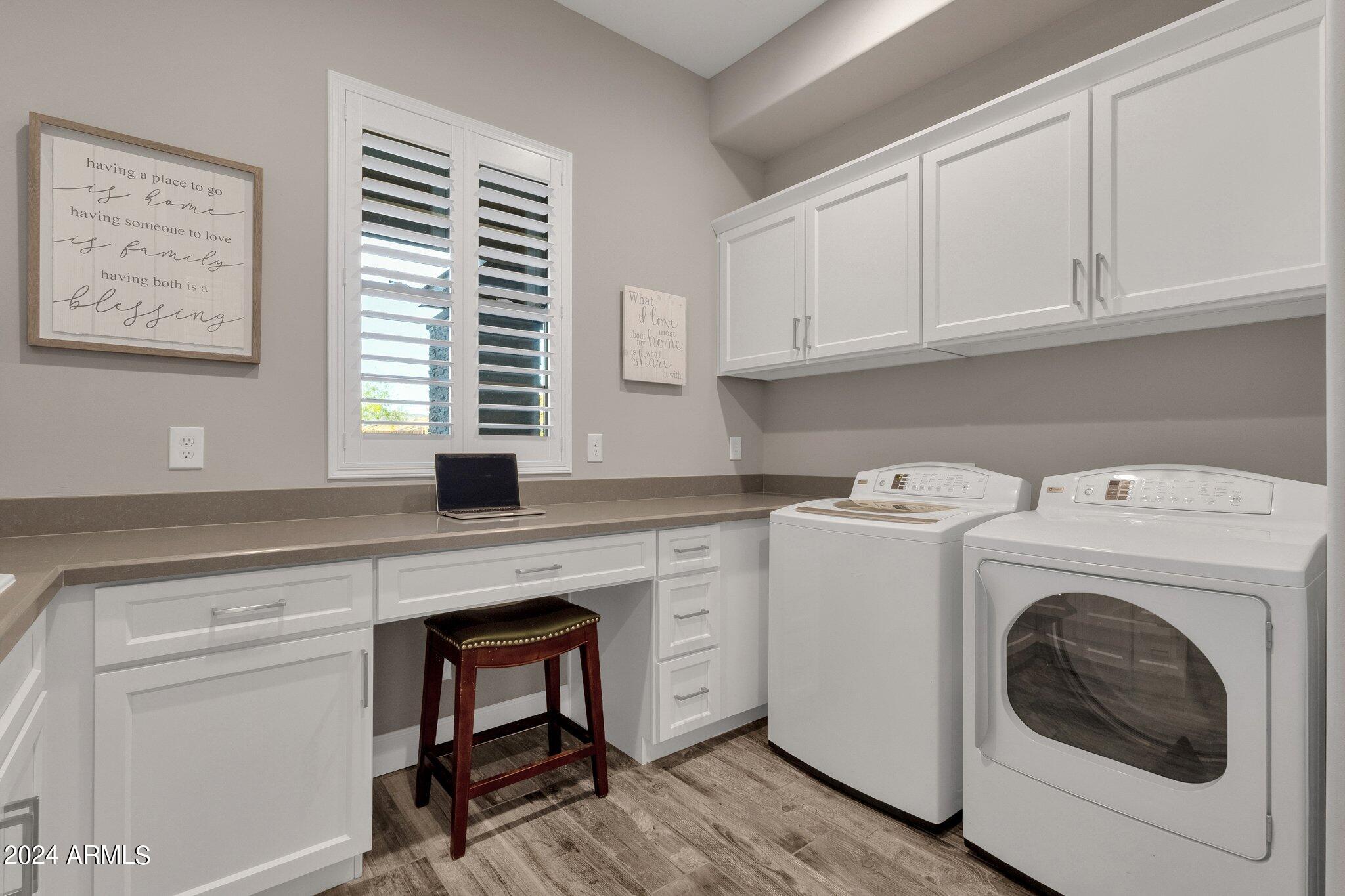 17565 Blaze Lane Rio Verde, AZ 85263 - Photo 52 of 76 LAUNDRY ROOM W/ STORAGE & WORKSPACE