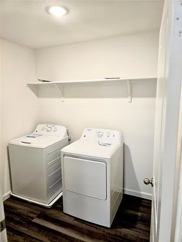 a view of a room with an empty walk in closet