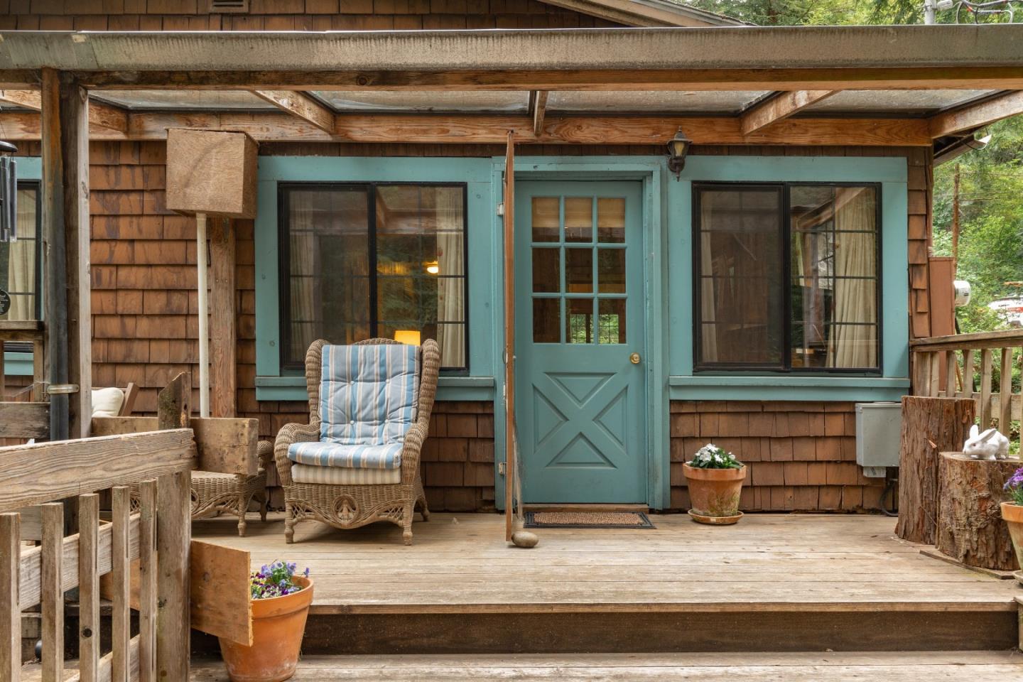 155 Brier Drive Boulder Creek, CA 95006 - Photo 1 of 42 a building outdoor space with patio furniture