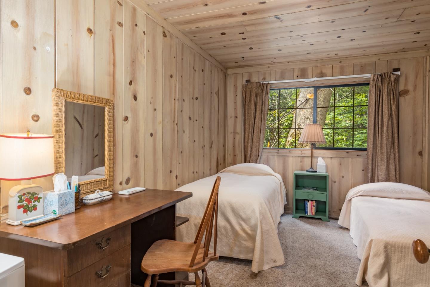 155 Brier Drive Boulder Creek, CA 95006 - Photo 15 of 42 a living room with furniture a large window and potted plants