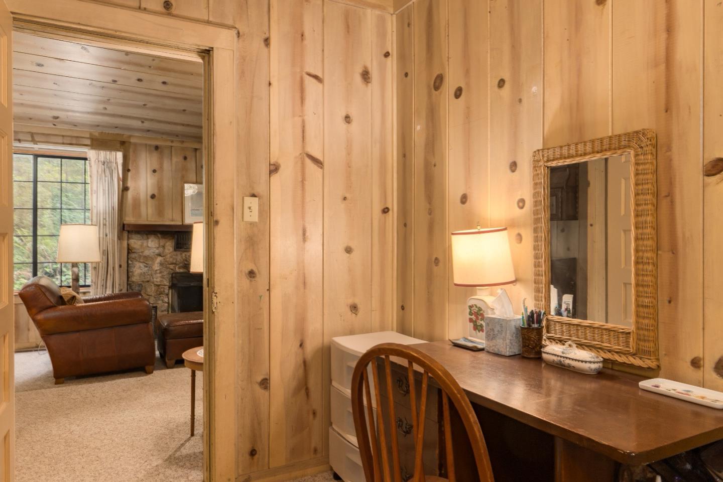 155 Brier Drive Boulder Creek, CA 95006 - Photo 16 of 42 a en suite bathroom with a granite countertop sink and a mirror