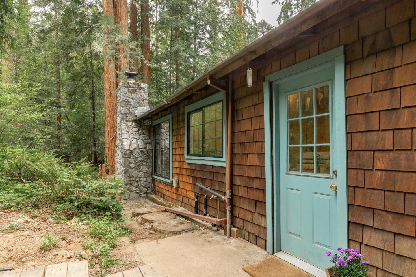 155 Brier Drive Boulder Creek, CA 95006 - Photo 36 of 42 a front view of a house with a yard