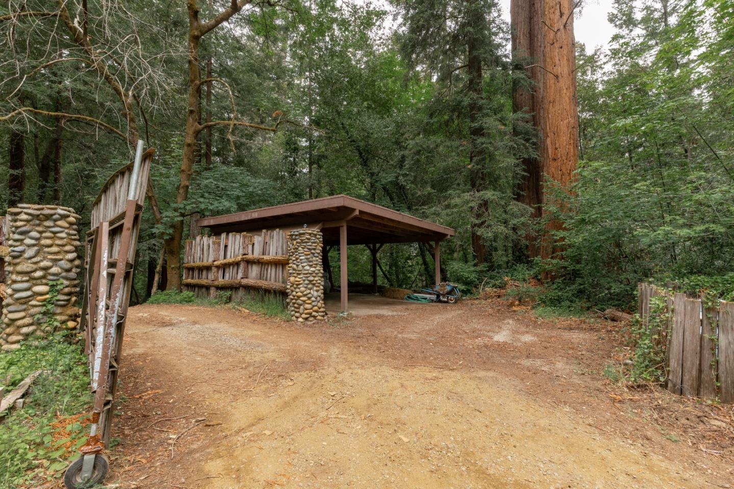 155 Brier Drive Boulder Creek, CA 95006 - Photo 40 of 42 a view of a house with backyard and trees