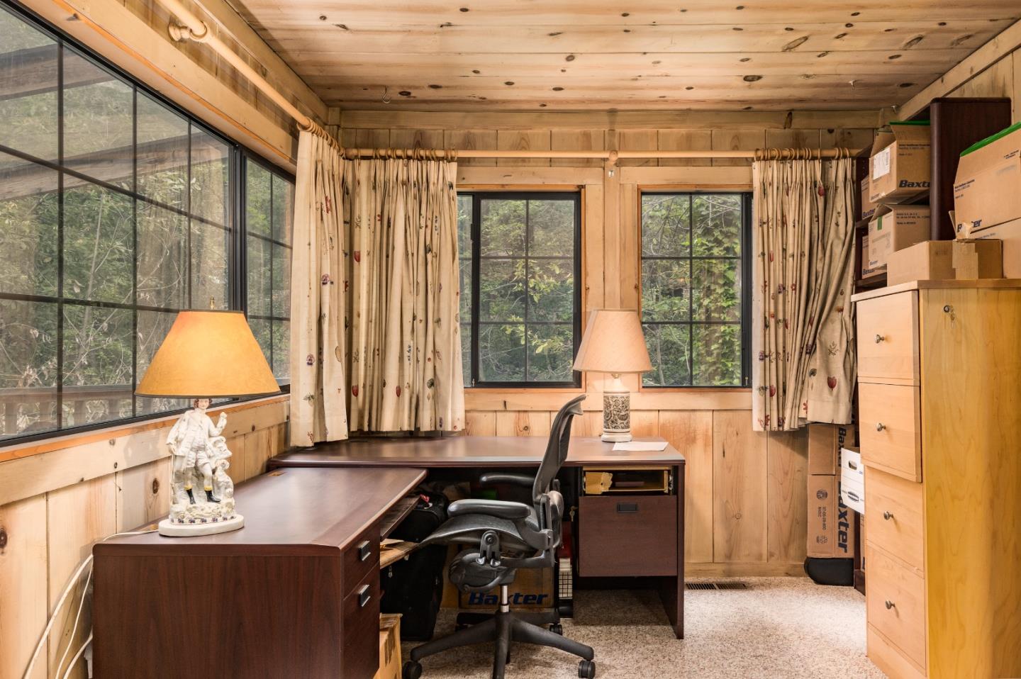 155 Brier Drive Boulder Creek, CA 95006 - Photo 10 of 42 a room with furniture and a window