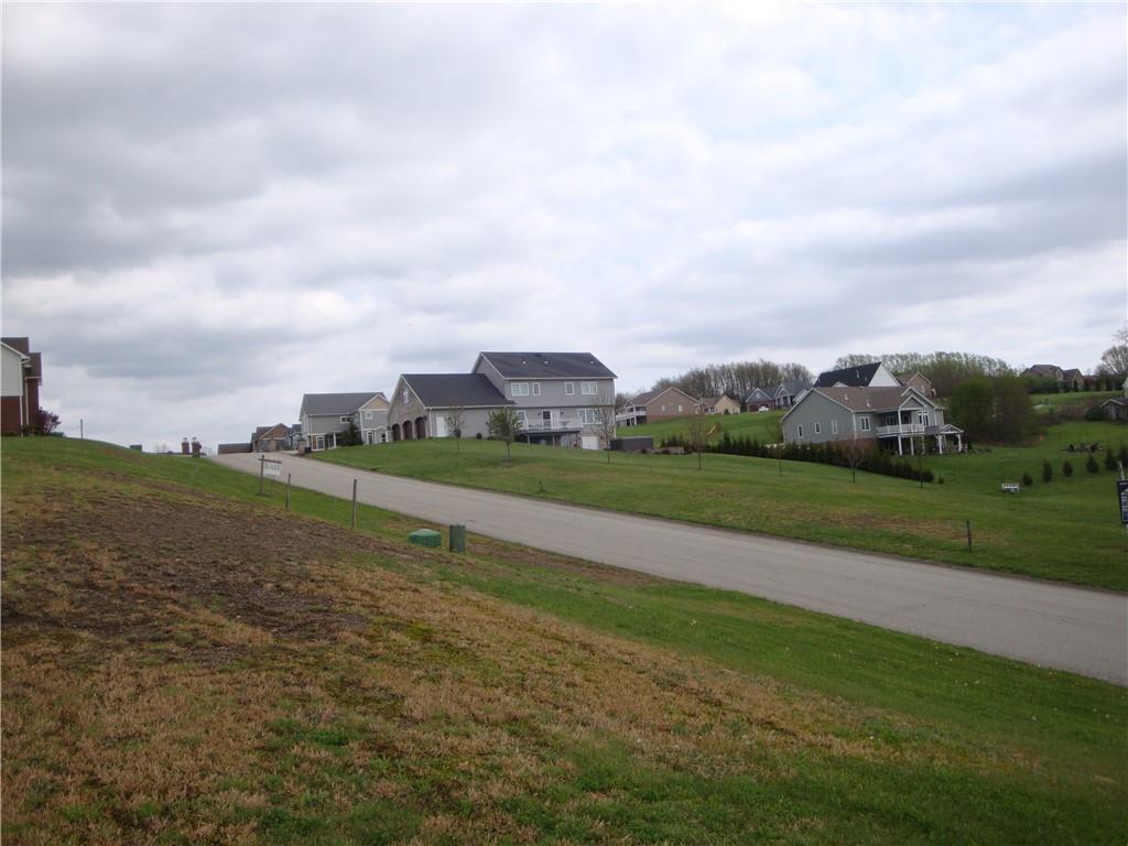 707 Victoria Way Derry, PA 15627 - Photo 2 of 3 a view of a lake with a big yard