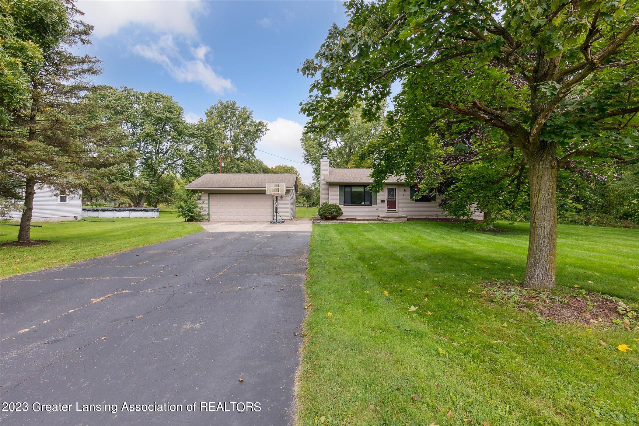 5151 Sleight Road Bath, MI 48808 - Photo 5 of 56 Deep lot, long driveway