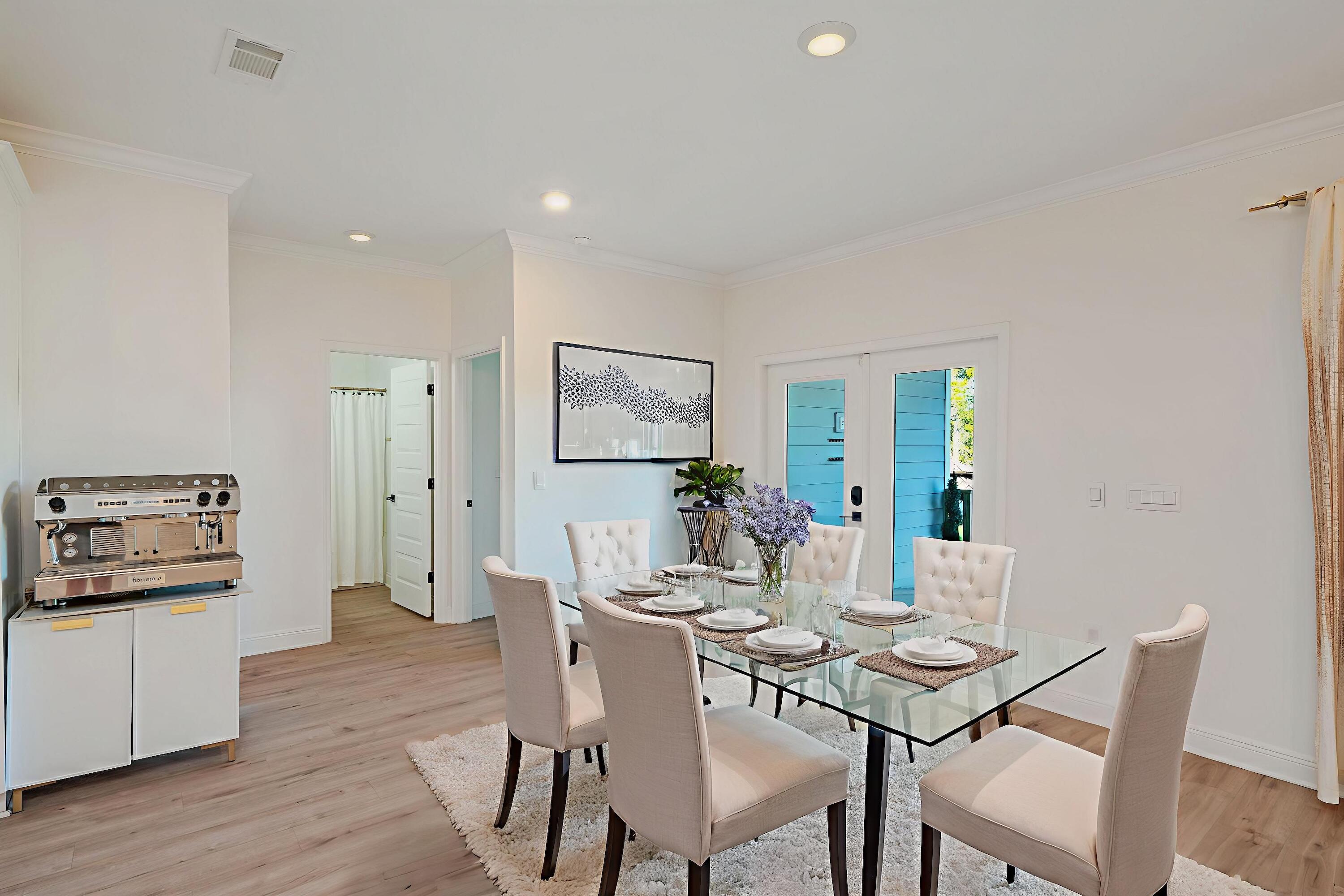 53 Palmer Lane Santa Rosa Beach, FL 32459 - Photo 17 of 62 a view of a dining room with furniture and wooden floor