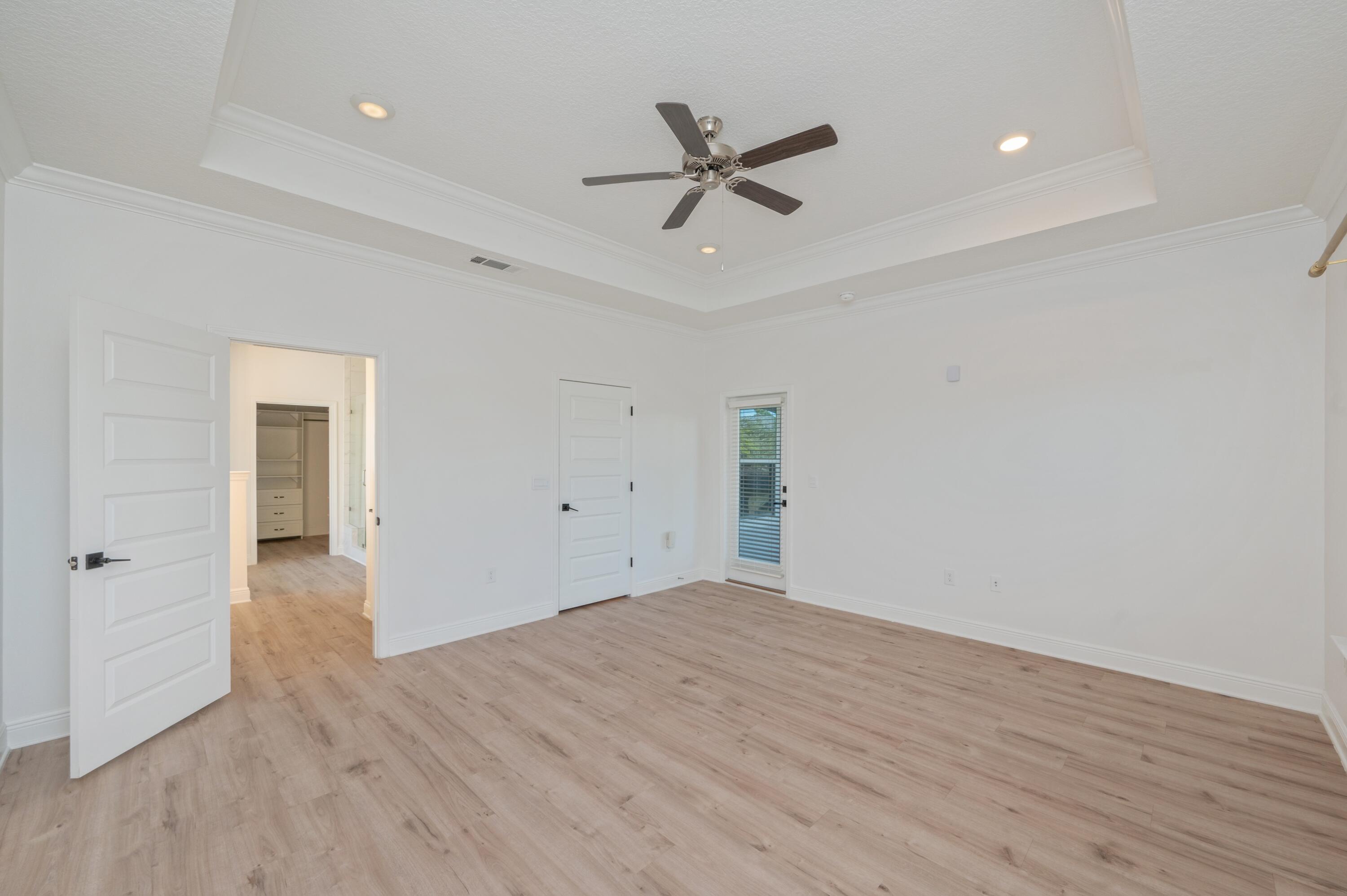 53 Palmer Lane Santa Rosa Beach, FL 32459 - Photo 24 of 62 a view of a livingroom with a ceiling fan and wooden floor