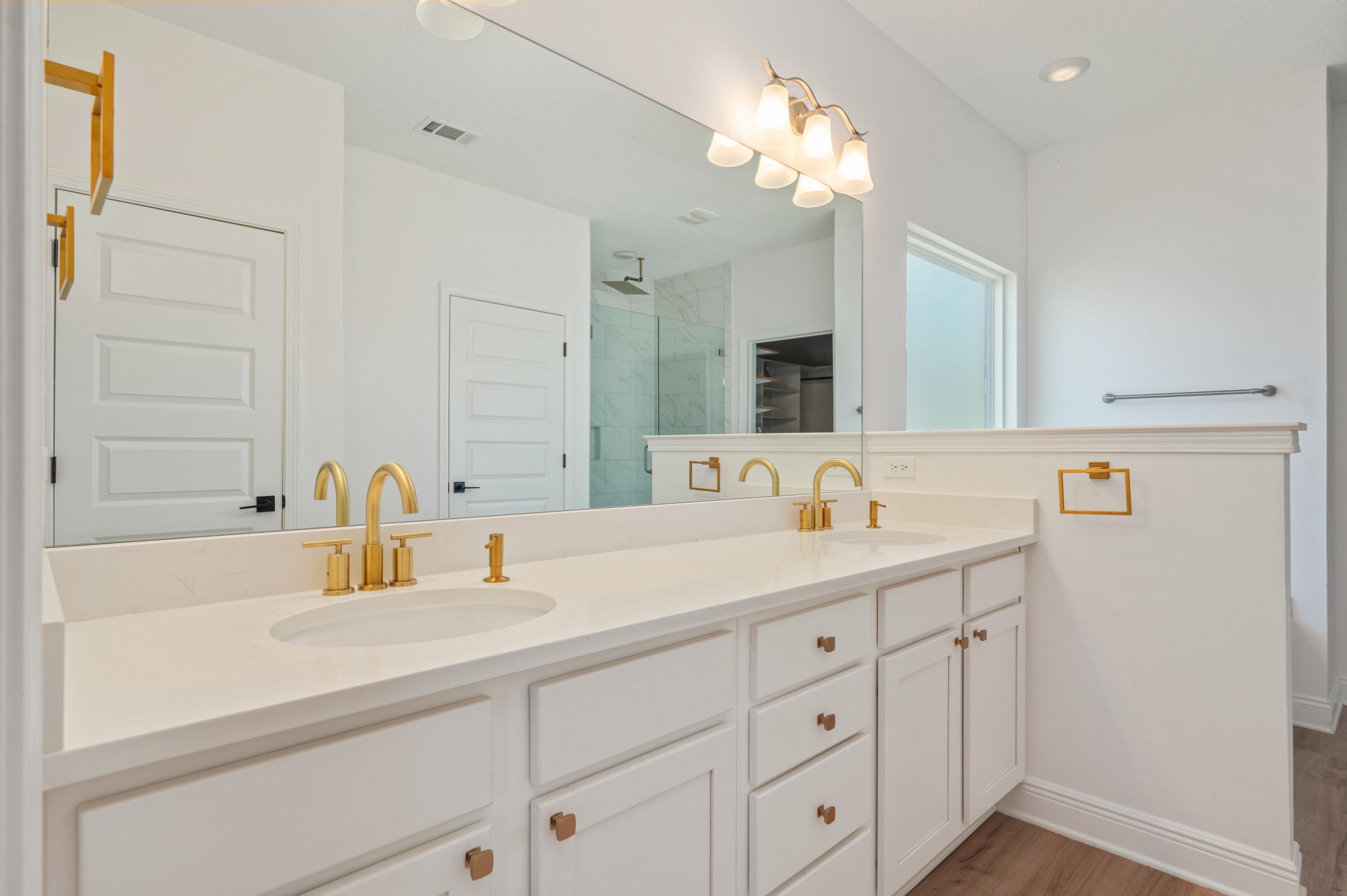 53 Palmer Lane Santa Rosa Beach, FL 32459 - Photo 27 of 62 a bathroom with a double vanity sink and a mirror