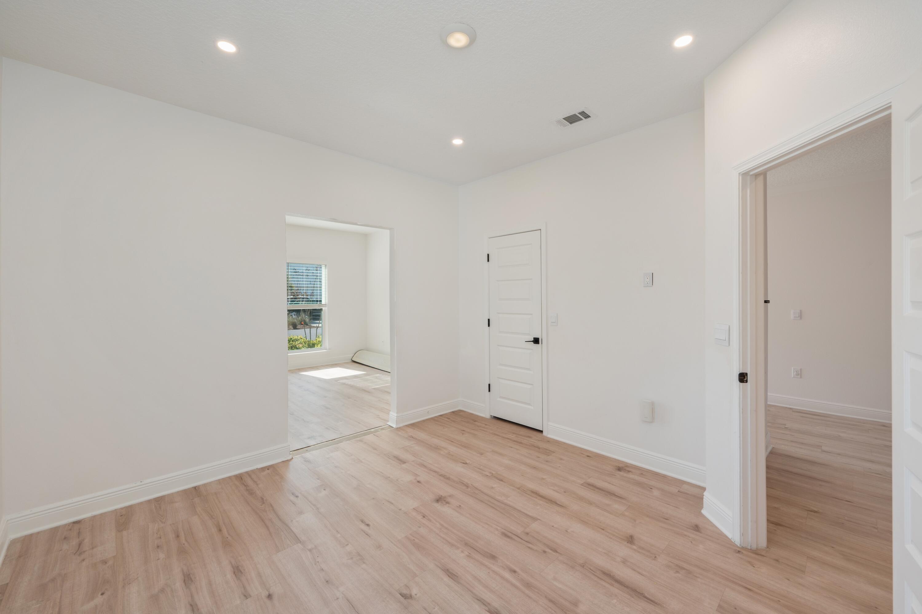 53 Palmer Lane Santa Rosa Beach, FL 32459 - Photo 40 of 62 a view of empty room with wooden floor
