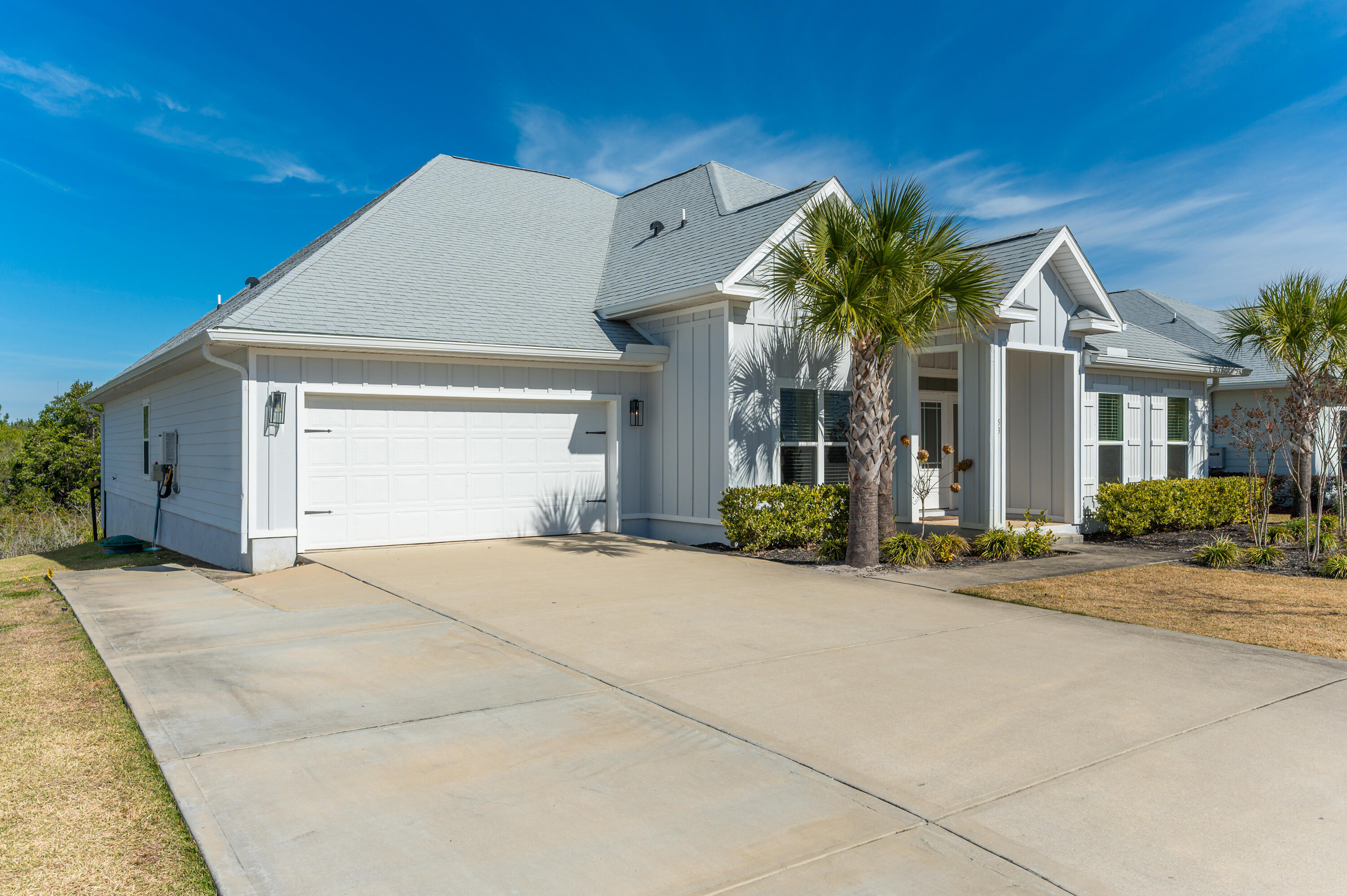 53 Palmer Lane Santa Rosa Beach, FL 32459 - Photo 4 of 62 a view of a house with a yard and potted plants