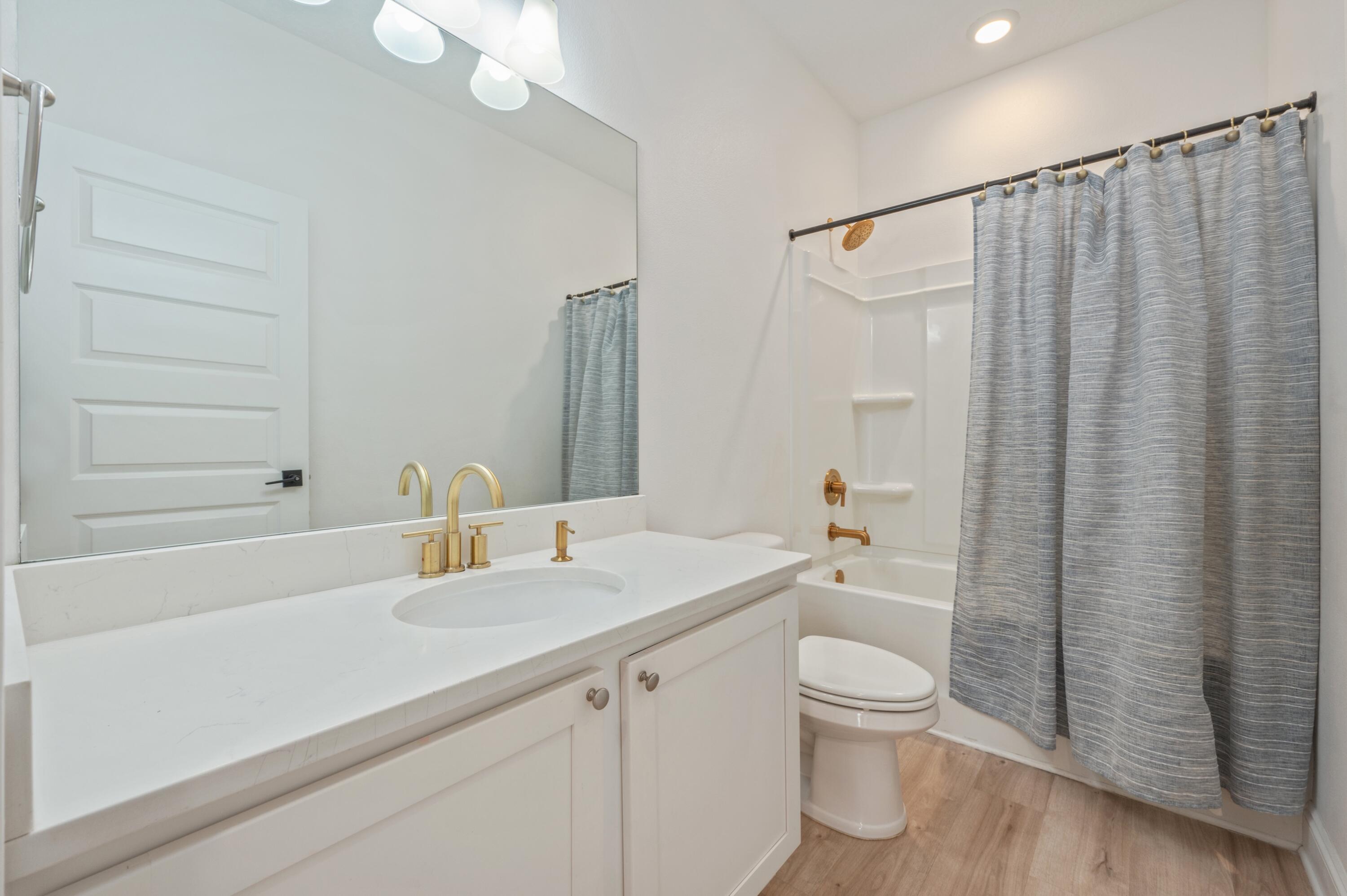 53 Palmer Lane Santa Rosa Beach, FL 32459 - Photo 47 of 62 a bathroom with a sink a toilet and shower
