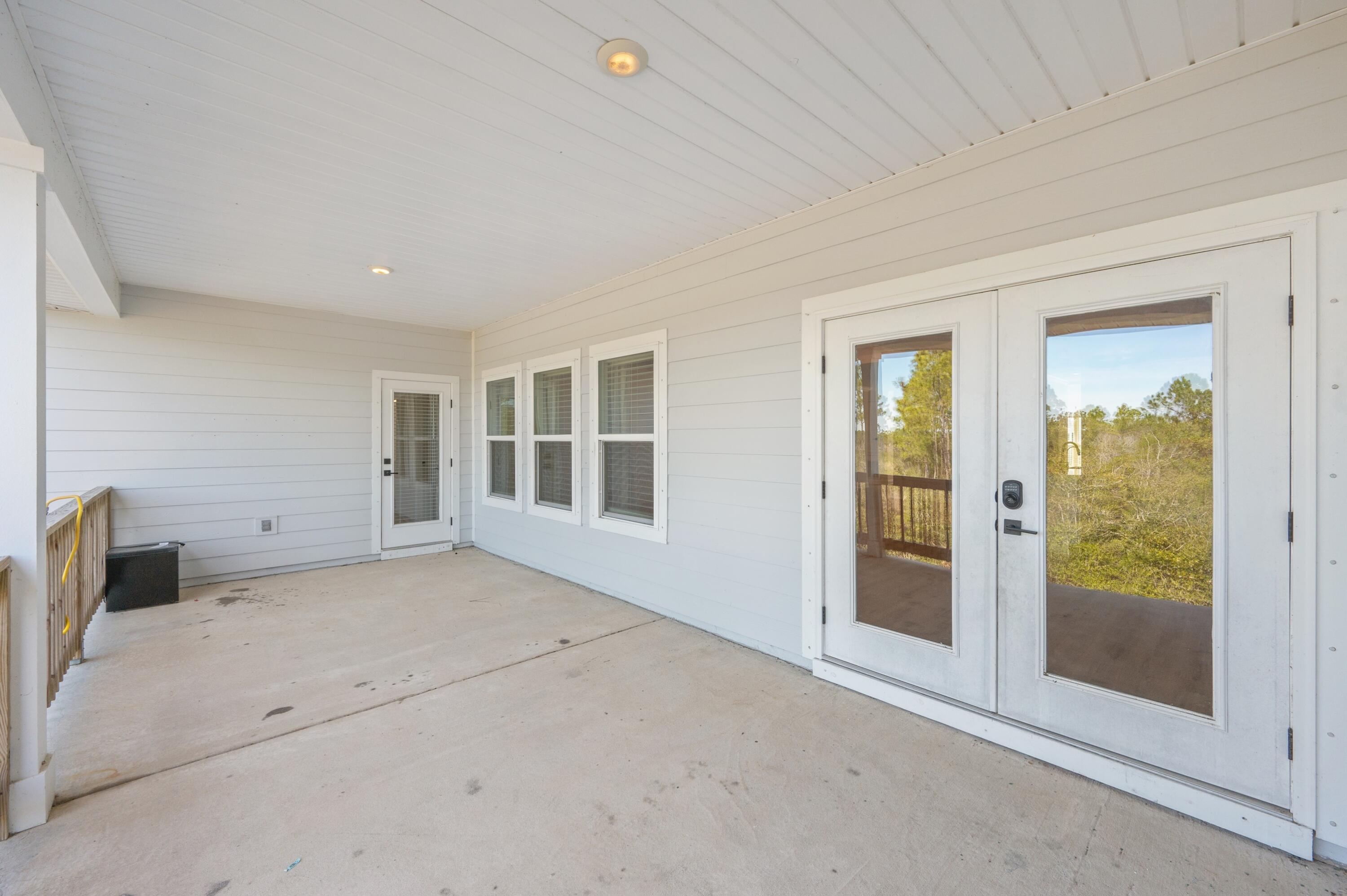 53 Palmer Lane Santa Rosa Beach, FL 32459 - Photo 49 of 62 a view of a room with a large window