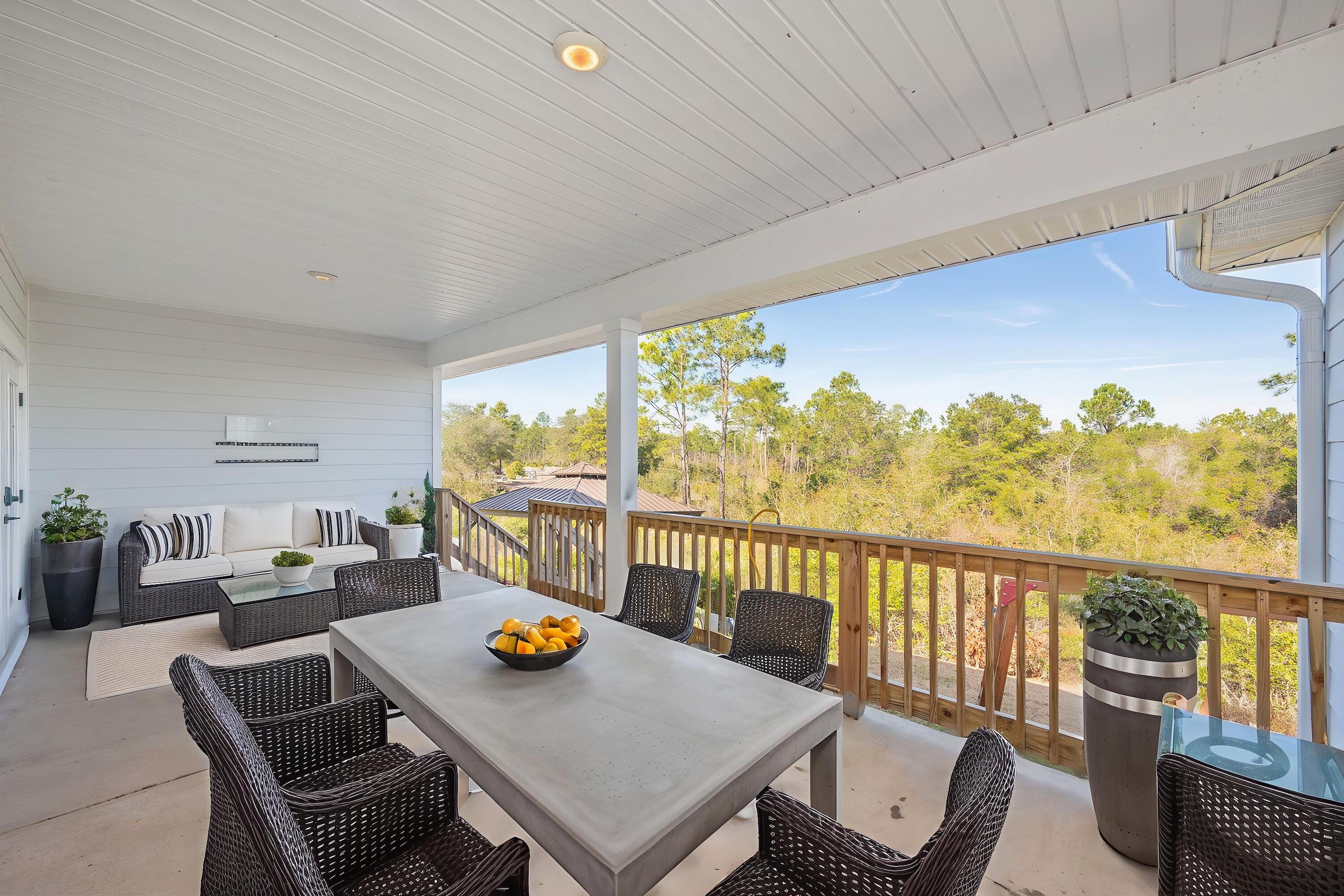 53 Palmer Lane Santa Rosa Beach, FL 32459 - Photo 51 of 62 a view of a dining room and furniture window and outside view